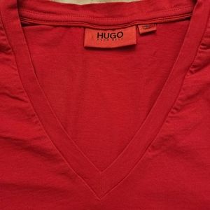 Men v-neck t-shirt short sleeve.  Red with logo in the bottom.